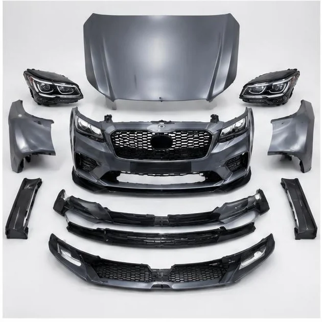 Exterior hood, bumper, grille and headlamp kit arranged for inspection