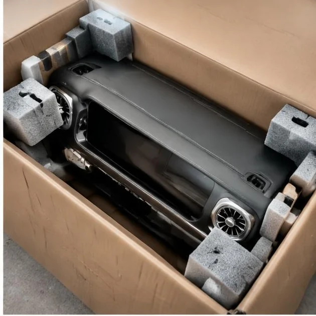 Finish-sensitive dashboard panel protected with foam guards in a carton