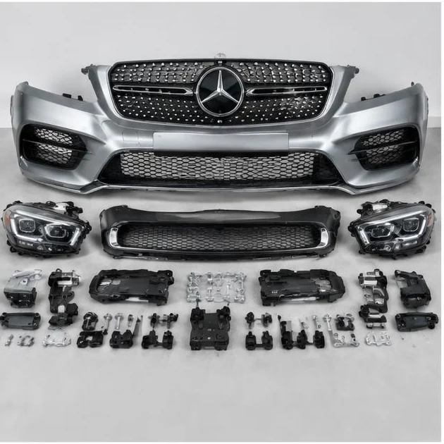 Detached bumper, grille, headlights and brackets for an exterior facelift — illustrative